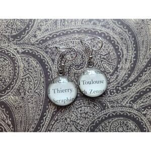 Thierry and Toulouse pendant earrings made with Blood and Honey book pages